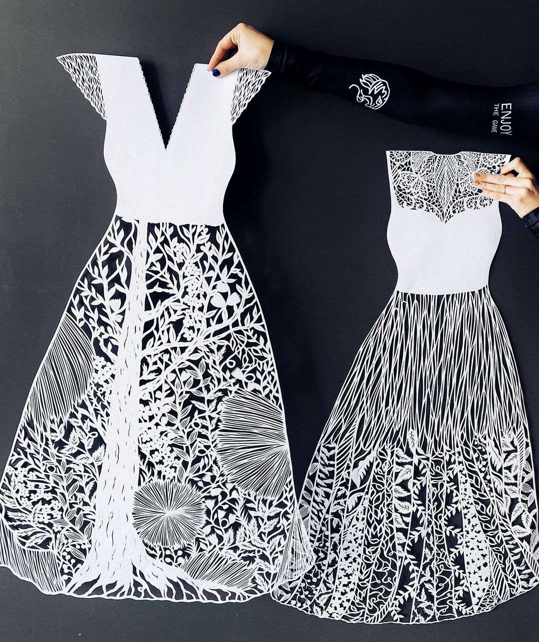 Artist transforms ordinary paper into the exquisite patterned dresses