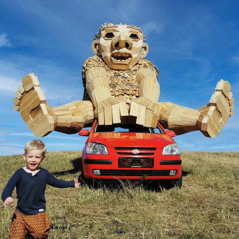 Danish Artist Creates Massive Wooden Troll Sculptures