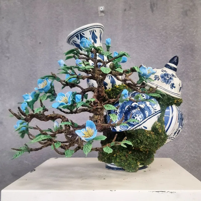 Stunning Bonsai Tree Sculptures Perfectly Combine Shattered Porcelain Pots
